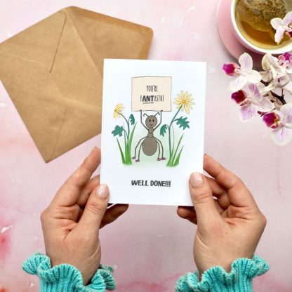 Hands holding Ant Well Done Card