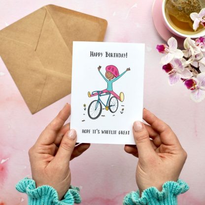 Hands holding Cyclist birthday card