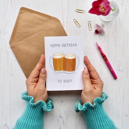 Hands holding Beer birthday card
