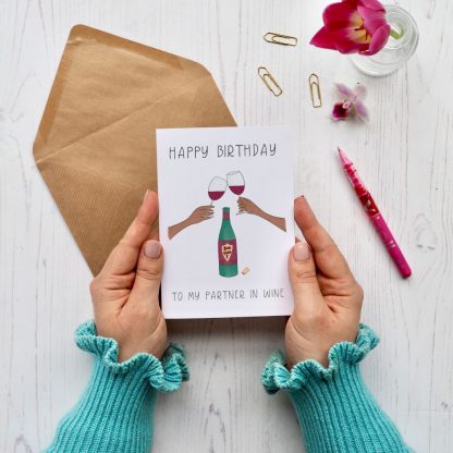 Hands holding Partner in Wine Birthday Card - Red wine